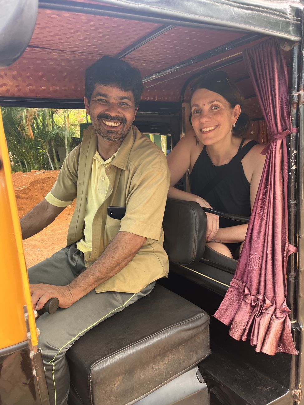 Alona with a rickshaw driver
