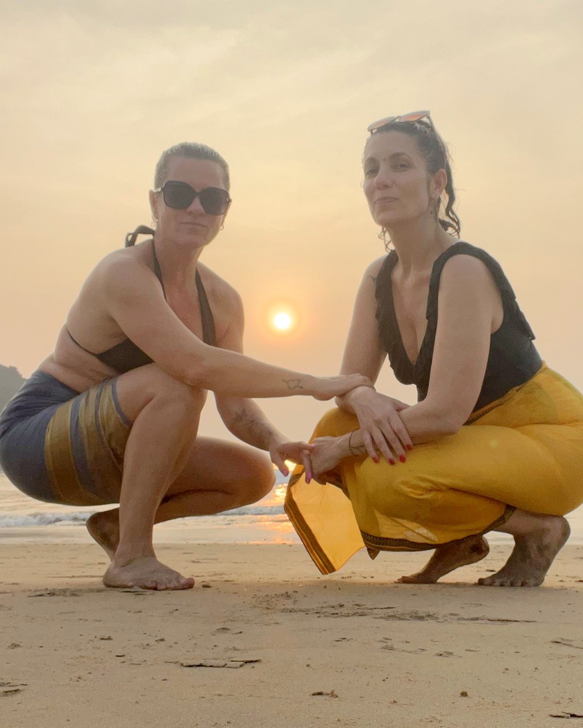 Alona and Duffi on Kudle Beach at sunset